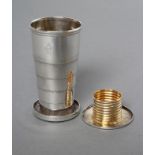 A VICTORIAN SILVER COLLAPSIBLE TOT, maker's mark T.J., London 1879, retailed by Nix, Silversmith,