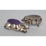 TWO SILVER PIG PIN CUSHIONS, one recumbent, maker Williams (B'ham) Ltd., Birmingham 1910, 2 1/4"