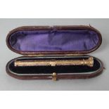 A VICTORIAN GOLD PLATED TELESCOPIC PENCIL, the screw-off top with polished bloodstone shield seal,