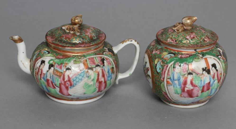 A CANTONESE PORCELAIN SMALL TEAPOT AND COVER of squat globular form, painted in famille rose enamels