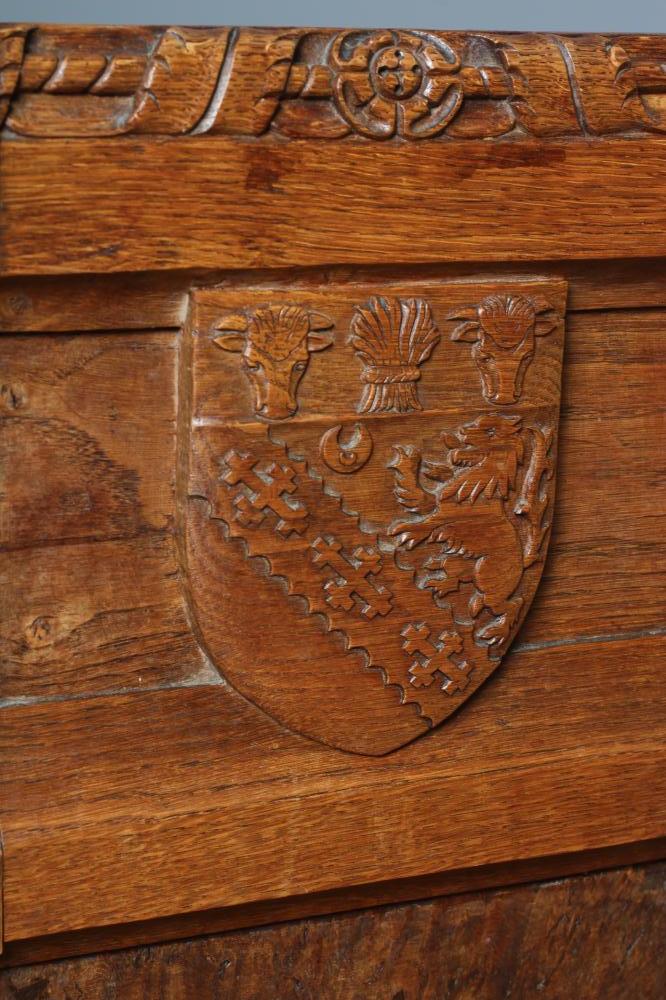 A PAIR OF ROBERT THOMPSON CARVED OAK HALL CHAIRS, the twin panel back bearing the Horlick crest - Image 2 of 5