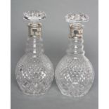 A PAIR OF CZECH LEAD GLASS & SILVER DECANTERS of triple ring neck form with mushroom stoppers and