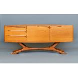 A SCOTTISH BEITHCRAFT TEAK SIDEBOARD, 1960's/70's, with mildly arched ledge back, two cupboard doors