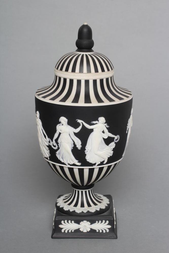 A WEDGWOOD BLACK JASPER DIP "DANCING HOURS" VASE AND COVER, late 20th century, impressed marks,