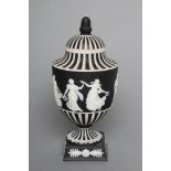 A WEDGWOOD BLACK JASPER DIP "DANCING HOURS" VASE AND COVER, late 20th century, impressed marks,