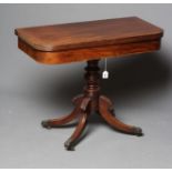 A GEORGE IV MAHOGANY FOLDING TEA TABLE of rounded oblong form with reeded edged top, plain frieze