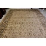 A PERSIAN STYLE WOOL CARPET, modern, the ivory field with an elegant repeating pattern of flowers in