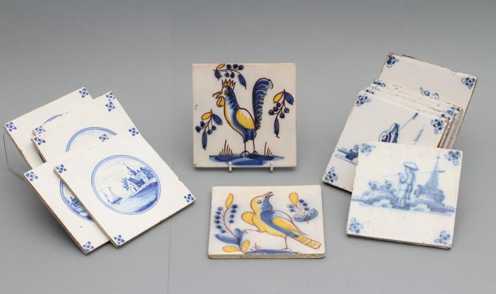 A COLLECTION OF FOURTEEN DUTCH DELFT TILES, 18th century, comprising seven with religious scenes and