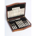 A SET OF TWELVE PAIRS OF SILVER FRUIT KNIVES AND FORKS, maker possibly Wilson & Gill, Sheffield