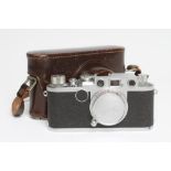 A LEICA CAMERA, No. 799099, IIF, red dial, with lens cover, original stitched leather case, together