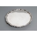 A SILVER SALVER, maker Frank Cobb, Sheffield 1942, of shaped circular form with pie crust rim,