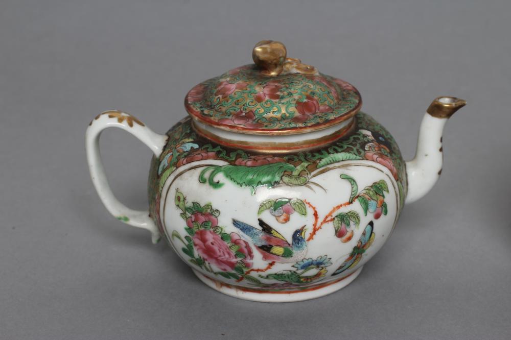 A CANTONESE PORCELAIN SMALL TEAPOT AND COVER of squat globular form, painted in famille rose enamels - Image 3 of 5