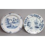 AN ENGLISH DELFT CHARGER, late 18th century, of plain dished circular form, painted in blue with a