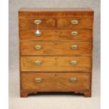 A GEORGIAN MAHOGANY STRAIGHT FRONTED TALL CHEST, c.1800, the caddy top over a banded frieze with