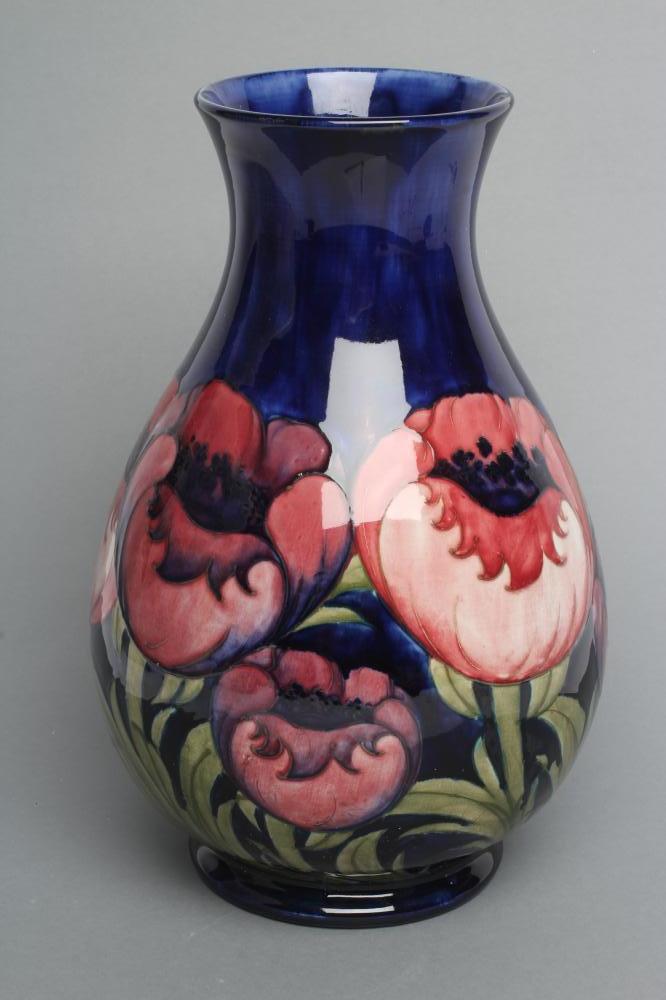 A MOORCROFT POTTERY ANEMONE PATTERN VASE, mid 20th century, of baluster form, tubelined and