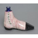 A SCOTTISH PEARLWARE NOVELTY SPIRIT FLASK, probably Portobello, c.1840, modelled as a lady's boot