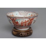 A DUTCH DECORATED CHINESE PORCELAIN SMALL BOWL of plain circular form, the exterior with pleat