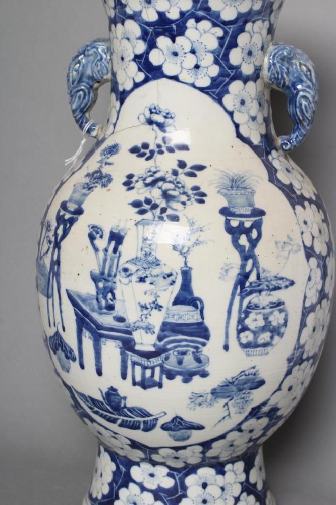 A CHINESE PORCELAIN VASE of bombe cylindrical form with two elephant head handles, painted in - Image 2 of 5