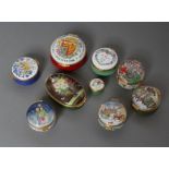 A COLLECTION OF EIGHT CRUMMLES ENAMEL BOXES including Christmas 1987/8/95 and Manor House Hotel,