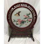 Chinese silk revolving needlework panel screen in circular frame on stand, small birds and