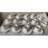 Set of 14 fine bone china coffee cans and 16 saucers with light infantry emblems. Impamark Ltd.