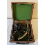A mahogany cased sextant, label on case B.Cooke & Son Ltd, est 1863, instrument makers Hull. Sextant