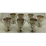 Seven hallmarked silver trophies, 7cms h, two inscribed R.Y.Y.C Thelma Victory cup 1949 and R.Y.Y.C.