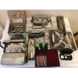 Vintage surgical equipment including WW II, cased ophthalmoscope Brady & Martin, surgical needles,