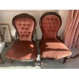 Two 19thC spoon backed nursing chair on turned front legs on castors. Upholstered in pink velvet,