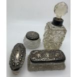 Hallmarked silver necked scent bottle and 3 hallmarked topped jars. Condition ReportLoose silver