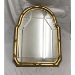 Decorative gilt framed arch top wall mirror with bevelled edge mirrors. 80 h x 59cms w. Condition