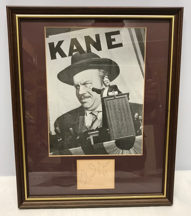Framed autograph and photo print Orson Welles. KANE. Autograph on paper 8 x 7cms and photo print