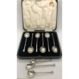 Boxed silver coffee spoons, Birmingham 1933, two salt spoons and a mustard spoon. 60.3gms total