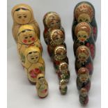 Three sets of hand painted Russian Babushka nesting dolls. Tallest 13cms.Condition ReportOne large