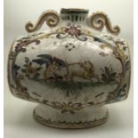A faience barrel shape spirit flask with polychrome decoration. Marked to the base with script F.