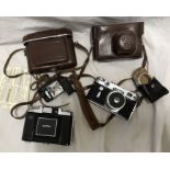 Cameras, Zeiss Ikon Nettax with flash unit and leather case and a Russian Zorki 6 camera with