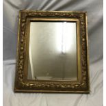 Gilded gesso framed wall mirror, fruit design, mirror size 31 x 40cms h. Condition ReportSome gilt