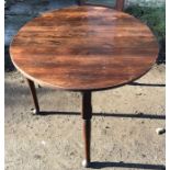 Georgian walnut planked top drop leaf gateleg dining table on pad feet and round legs. 102 l x