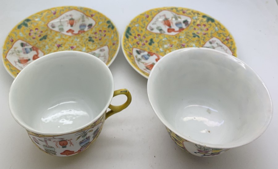 Chinese famille jeune tea bowl, cup and two saucers with square seal marks. Condition ReportNibble - Image 2 of 9