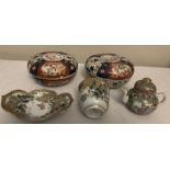 Oriental ceramics to include two Japanese Imari lidded bowls, Satsuma cup and saucer with missing