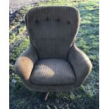 A 1970's brown dalon upholstered swivel armchair by Swedfurn slattle mobler ab Toreboda Sweden.