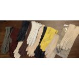 Eleven pairs of vintage kid leather suede gloves to include long evening gloves.Condition
