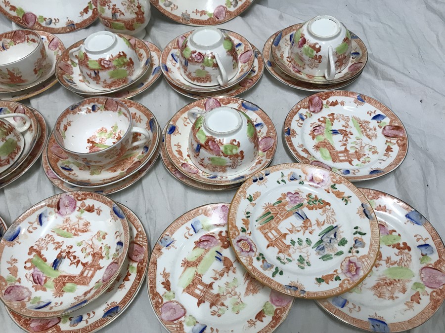 A part tea service, 2 cake plates, jug, 11 cups, 12 saucers, 16 side plates, garden design. 1 bowl. - Image 3 of 4