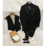 A gentleman's evening dress to include tailcoat, measuring across shoulders 44cms x 110cms l,