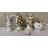 Continental porcelain to include putti figurines, playing instruments, 20cms h, a teapot, jug and
