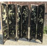 Japanese black lacquer 6 panel folding screen with mother of pearl and gilt floral decoration.