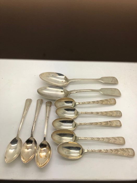 Hallmarked silver teaspoons to include 5 London 1908/09 with bright cut engraving. 3 Sheffield