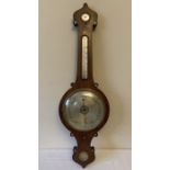 A 19thC rosewood, banjo barometer. William Hanson Hexham, 2 dial. 104 h x 33cms w. Inlaid with