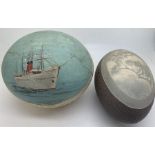 Two decorated eggs, Ostrich egg RMS Dunottar Castle and Emu egg carved with animals and trees.