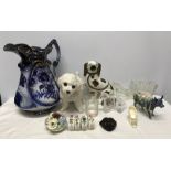 Mixed lot, large water jug blue floral design, 33cms h, Pottery dog with glass eyes 22cms h,